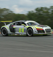 Limitless Racing's Jason Lee blasts past the pits in his Audi R8 GT LMS